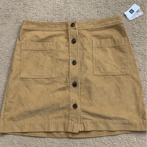 Women's GAP skirt size medium, tan/brown color, features a button-up design. - Picture 1 of 4